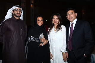 With guests at gala event